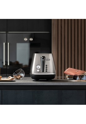 Delonghi Тостер Distinta 900Вт, метал, нековзні ніжки, титановий