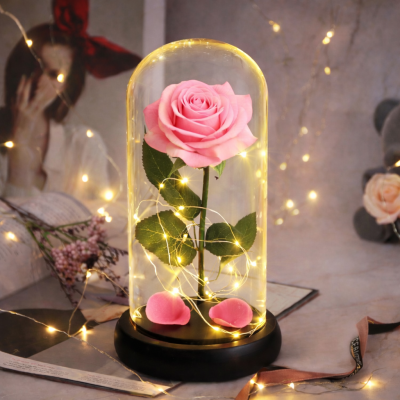Троянда в колбі з LED підсвічуванням на чорній підставці
