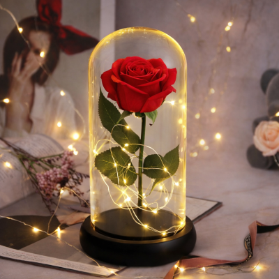 Троянда в колбі з LED підсвічуванням на чорній підставці