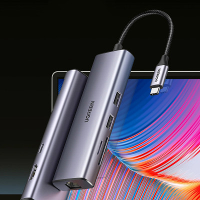Док-станція USB3.1 Type-C --> HDMI 4K60Hz/USB 3.0x2/RJ45/SD/TF/PD 100W Ugreen CM512 Сіра Док-станція USB3.1 Type-C --> HDMI 4K60Hz/USB 3.0x2/RJ45/SD/TF/PD 100W Ugreen CM512 Сіра